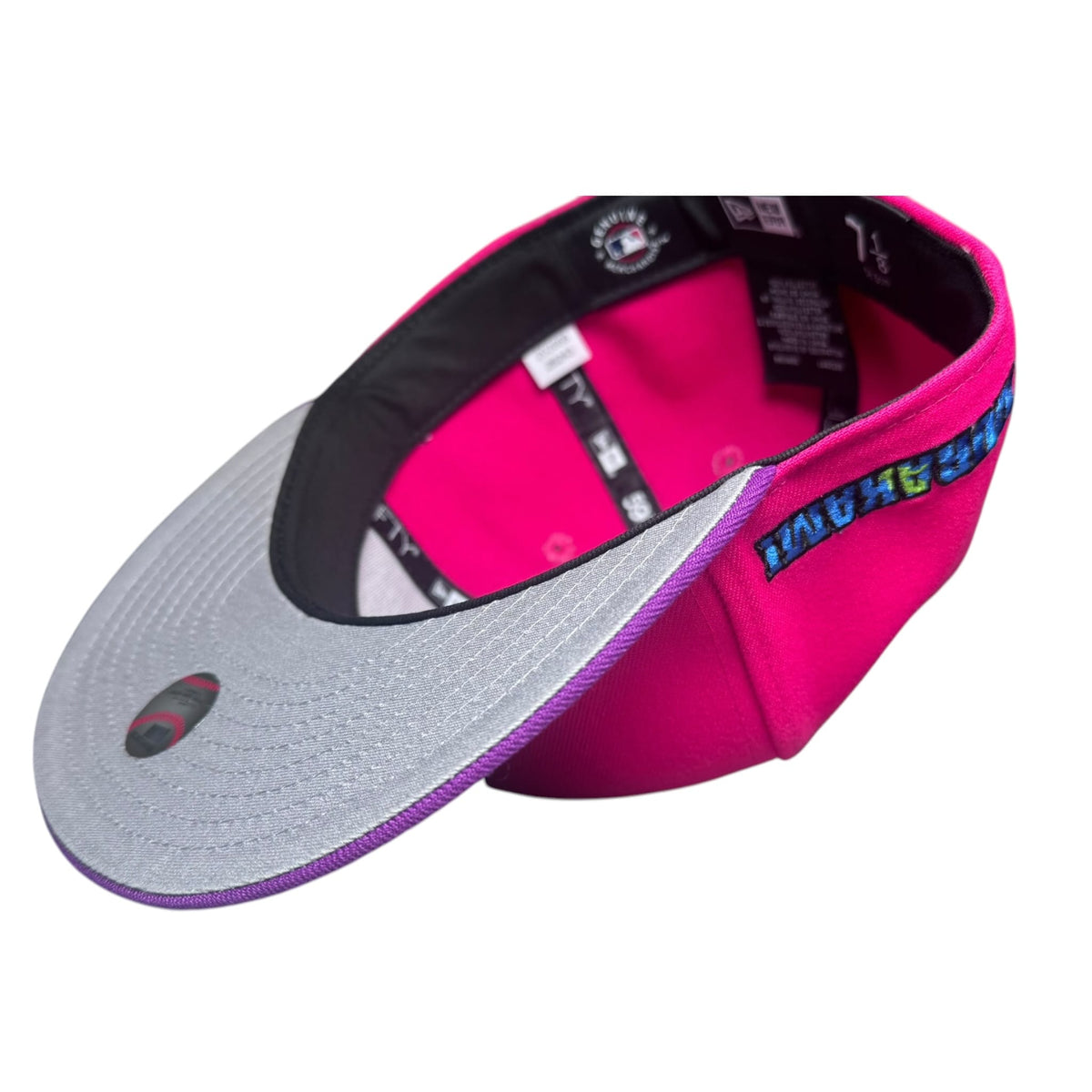 The Hat Wall Murakami Chicago White Sox fitted hat in hot pink with a purple brim and colorful side embroidery.